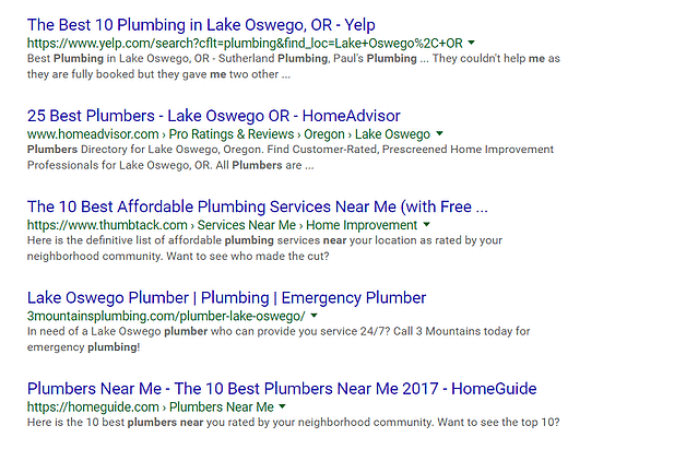 Organic results appear below paid ads.